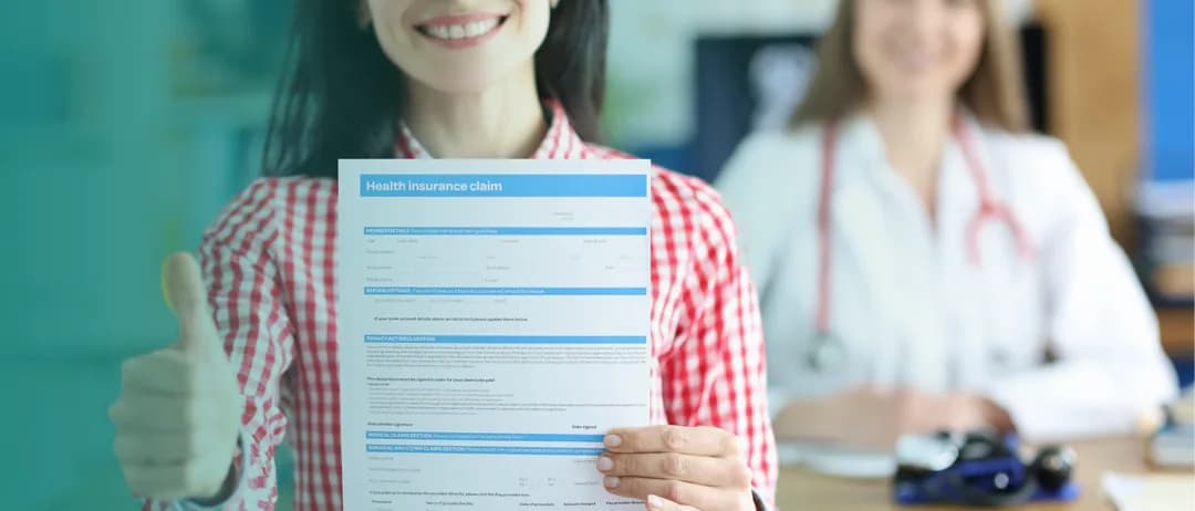 A smiling woman holds up a medical certificate