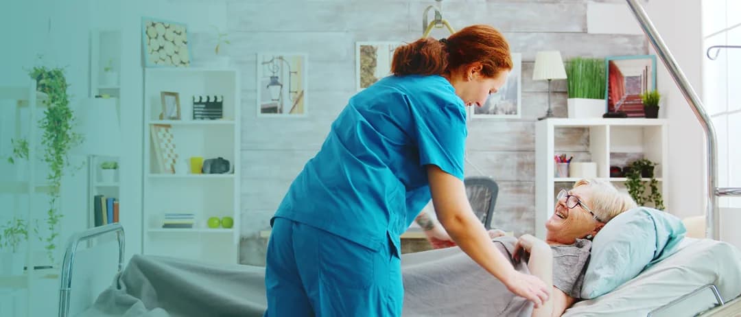 A nurse with a patient resting in a clinic bed
